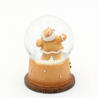 6.5cm Gingerbread Santa Snow Globe- Assorted Designs image